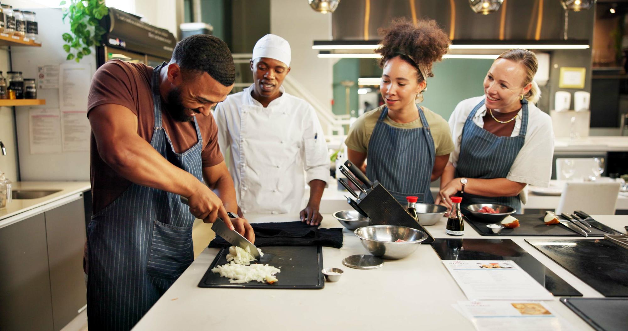 Team in a modern kitchen collaborating